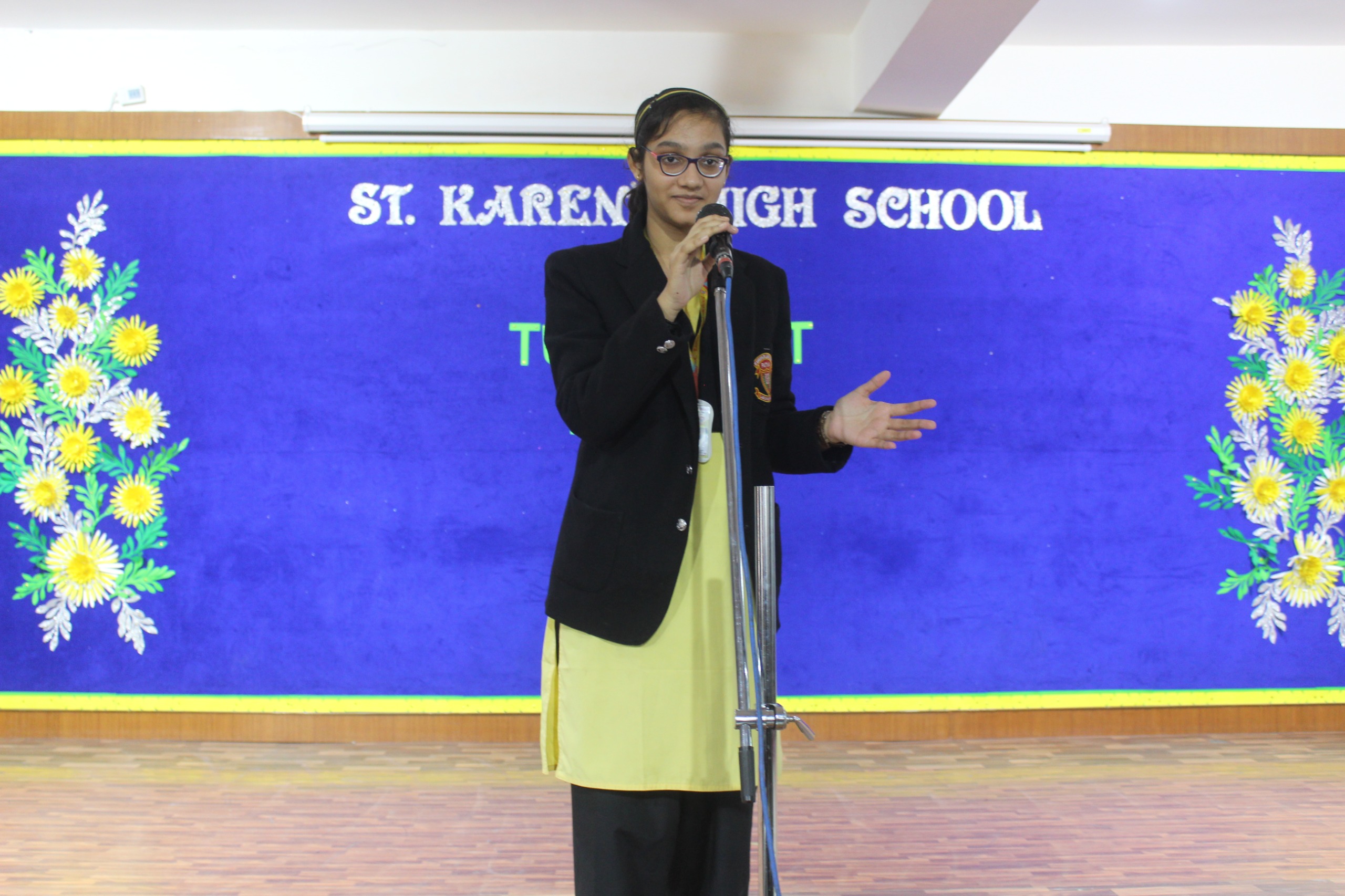 A participant in the debate competition at St. Karen’s High School 