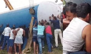 youth rescued from under the tanker