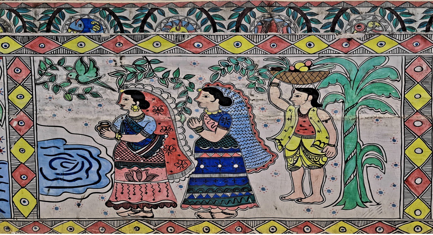 A Madhubani painting depicting devotees participating in the Arghya ritual of Chhath Puja, with man carrying fruit basket and women holding kalash as offerings to the sun god. The nearby sugarcane tree represents fertility, an essential symbol in the festival. 