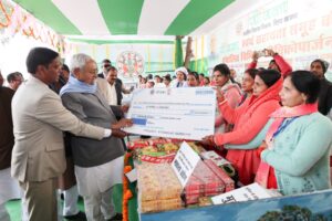 Symbolic Cheques Distributed to Beneficiaries