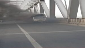 Car Catches Fire on JP Ganga Bridge After High-Speed Collision, Three Escape