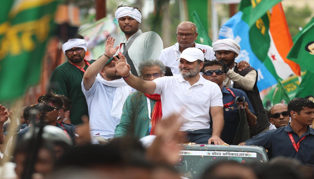 Congress leader Rahul Gandhi addressing supporters during the Voter Adhikar Yatra in Nawada, Bihar, with Tejashwi Yadav by his side.
