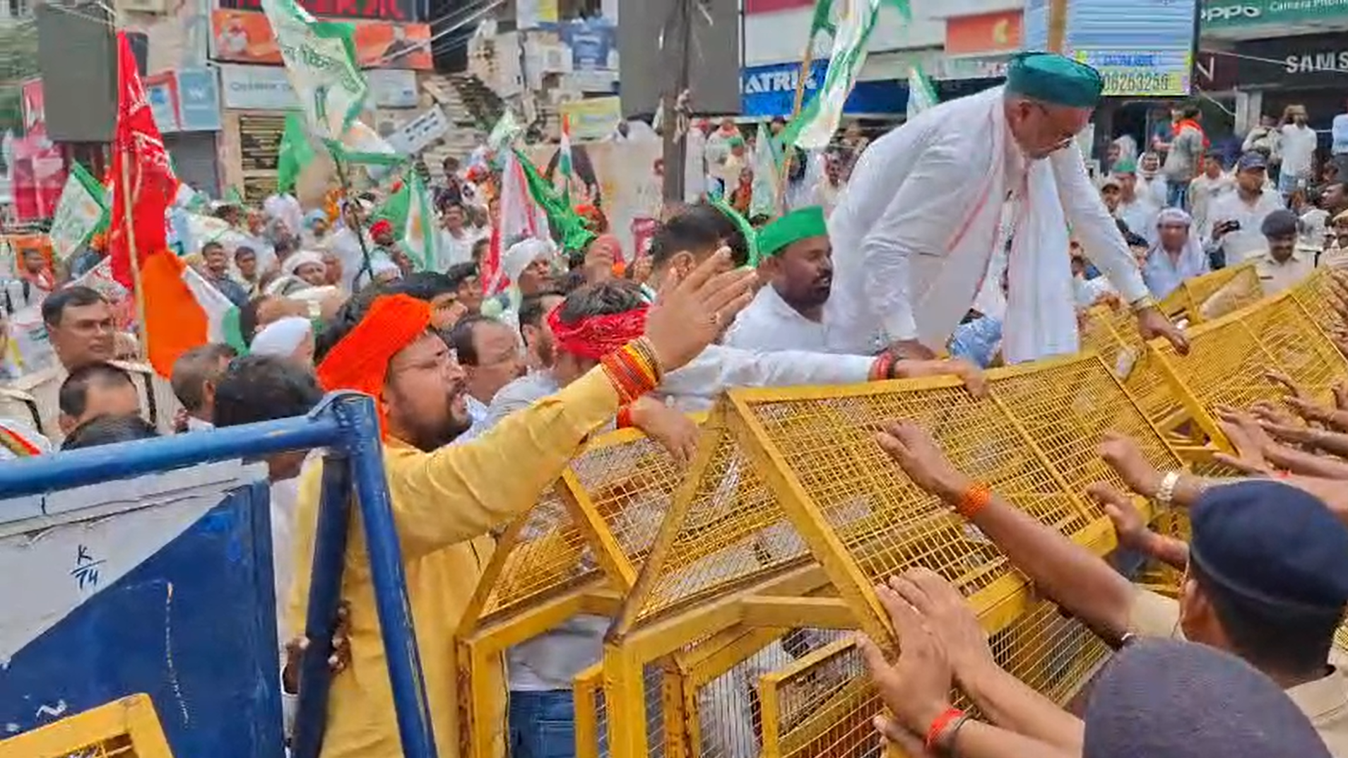 Farmers stopped by police barricades at Dakbungla in Patna during a protest against land acquisition.