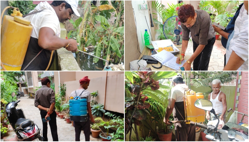 Municipal workers spraying anti-larvae solution on rooftops and streets in Patna to prevent mosquito-borne diseases.