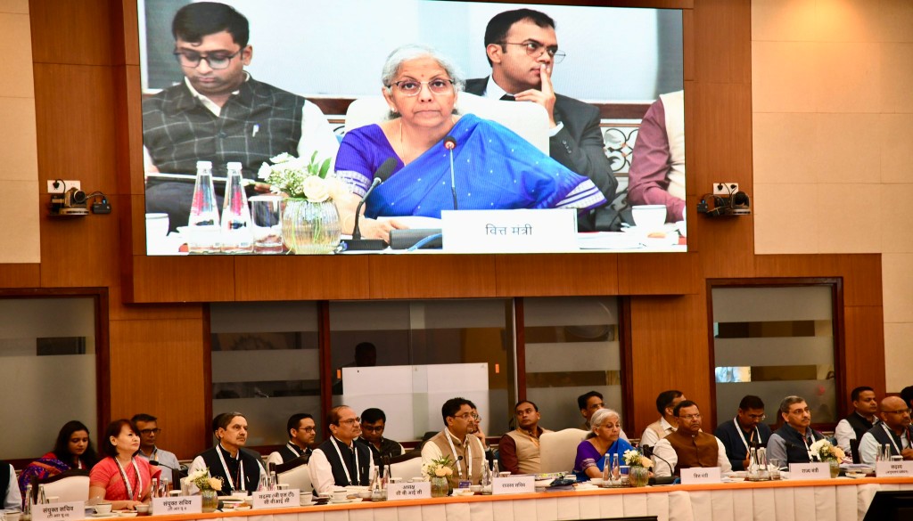 Finance Minister Nirmala Sitharaman chairing the GST Council meeting with state finance ministers discussing potential GST rate changes.
