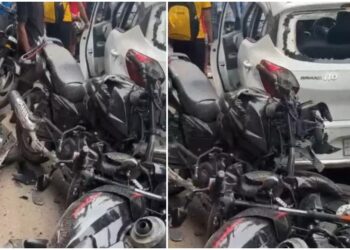 A damaged car and bikes at the accident site on Atal Path in Patna, where four people including two children were injured.
