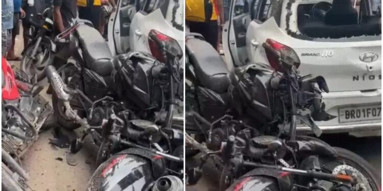 A damaged car and bikes at the accident site on Atal Path in Patna, where four people including two children were injured.