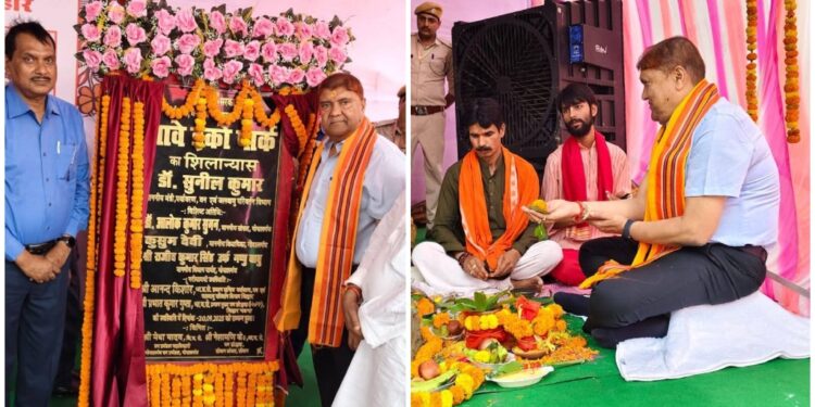Forest Minister Dr Sunil Kumar laying the foundation stone of the eco-tourism park in Thawe, with officials and locals witnessing the ceremony.