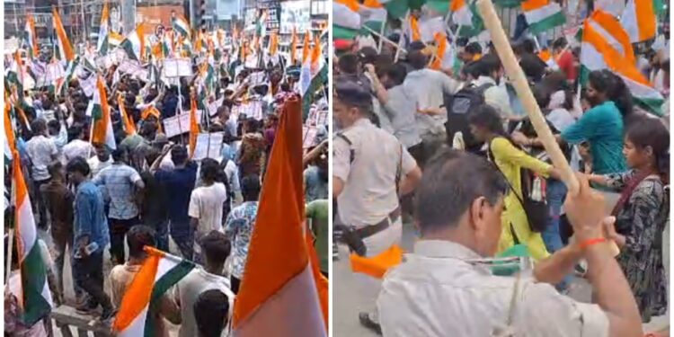 Police personnel use batons to disperse protesting recruitment candidates in Patna as demonstrators wave tricolour flags; a woman was injured during the clash.