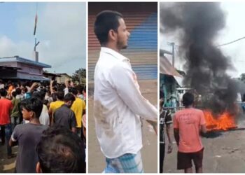 Police firing warning shots to control a crowd outside a temple in Purnia after Durga idols were vandalized.
