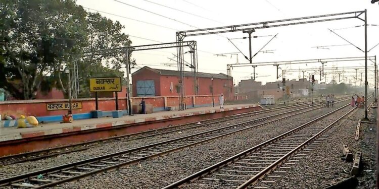 Buxar railway station platform with trains, where ballastless tracks will be installed to enhance speed and passenger comfort.