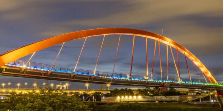 Rainbow-coloured pedestrian bridge over the Panchane river near Ashanagar Surya Temple in Nalanda, Bihar