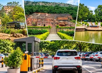 Representative image of tourists and vehicles at a parking facility near Rajgir's tourism sites