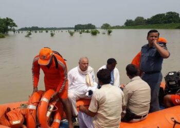 Patna district administration teams carrying out flood relief and rescue operations in affected areas
