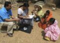 Enumerators conducting household surveys for Census