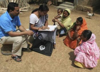 Enumerators conducting household surveys for Census