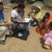 Enumerators conducting household surveys for Census