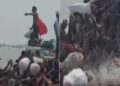 people jump in floodwater as ration reach on boat in Manas area of Danapur in Bihar