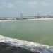 Durga idol immersion ghat in Patna, highlighting PMC preparations for artificial ponds and festival sanitation.