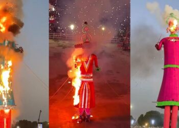 A 90-foot Ravan effigy burns amid colourful smoke and fireworks during the Dussehra celebration at Gandhi Maidan in Patna.