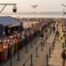 AI-generated representative image of crowd management with CCTV cameras, drones and a control room at a major public event in Bihar
