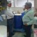 Food safety officials inspecting food products during a food safety drive in Bihar, including inspections in Patna
