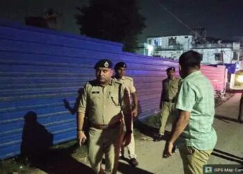 Police investigate the site of the alleged acid attack on a woman doctor in Begusarai, Bihar.