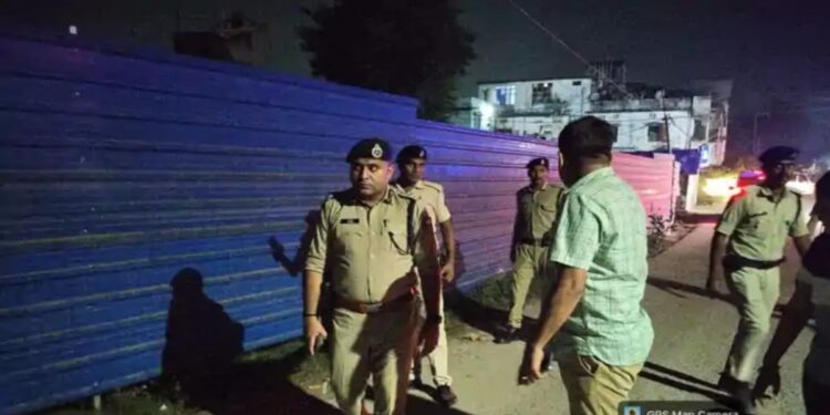 Police investigate the site of the alleged acid attack on a woman doctor in Begusarai, Bihar.