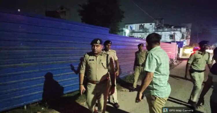 Police investigate the site of the alleged acid attack on a woman doctor in Begusarai, Bihar.