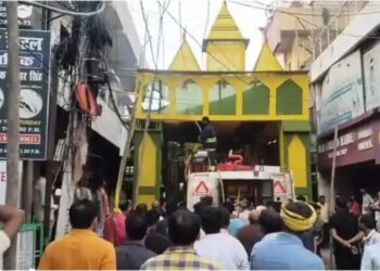 Fire breaks out at a Durga Puja pandal in Patel Nagar, Patna, as firefighters work to bring the blaze under control.