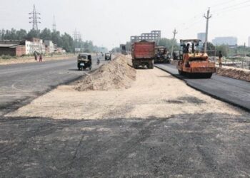 Flood-damaged road undergoing repair work in Patna