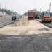 Flood-damaged road undergoing repair work in Patna
