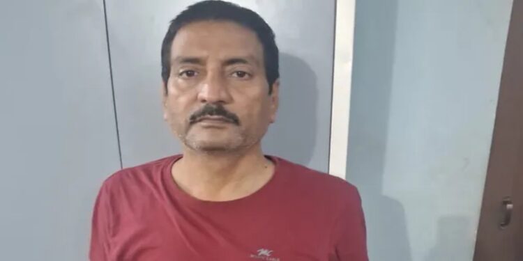 Economic Offences Unit officials arrest former Motor Vehicle Inspector Sunil Kumar Singh in connection with the alleged wrongful auction of a stolen Scorpio seized with liquor in Gopalganj.